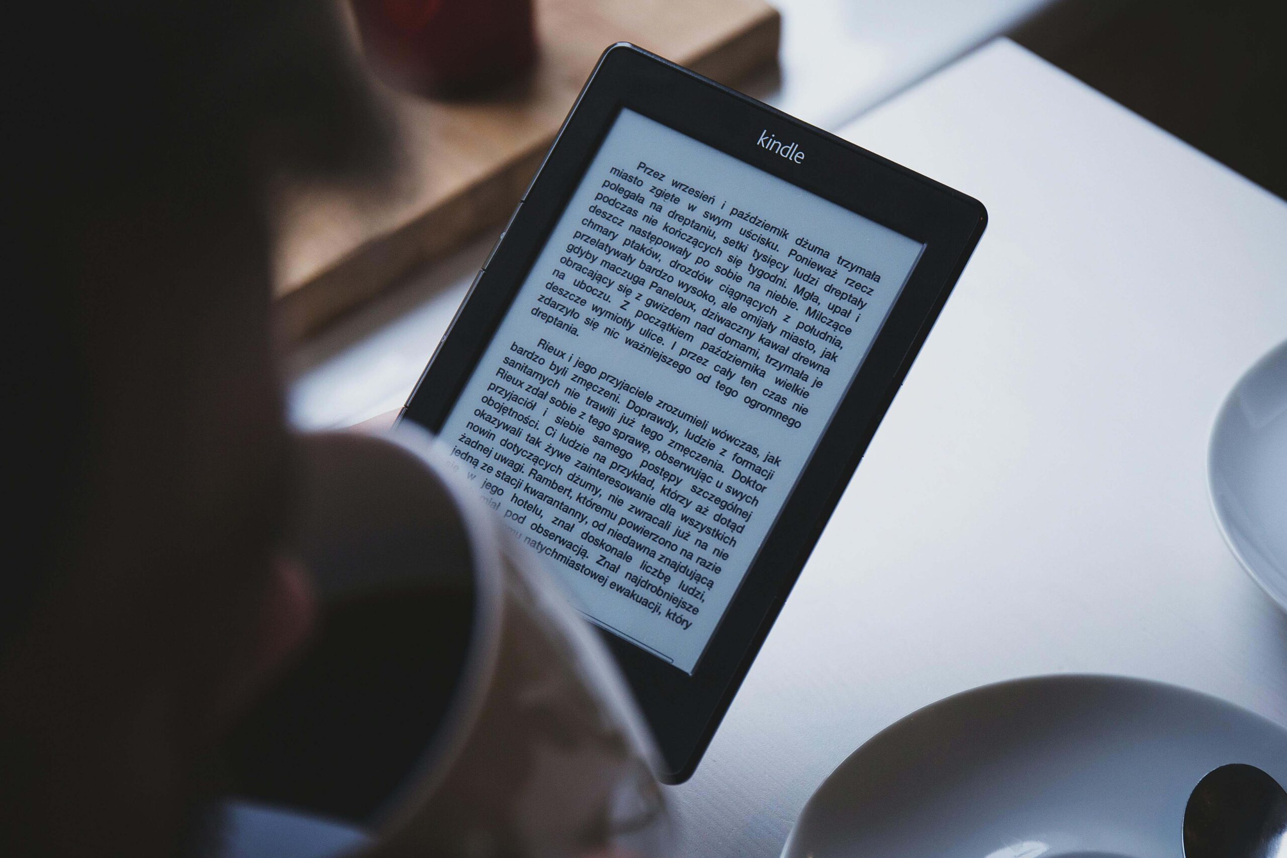 Reader reading kindle on an tablet
