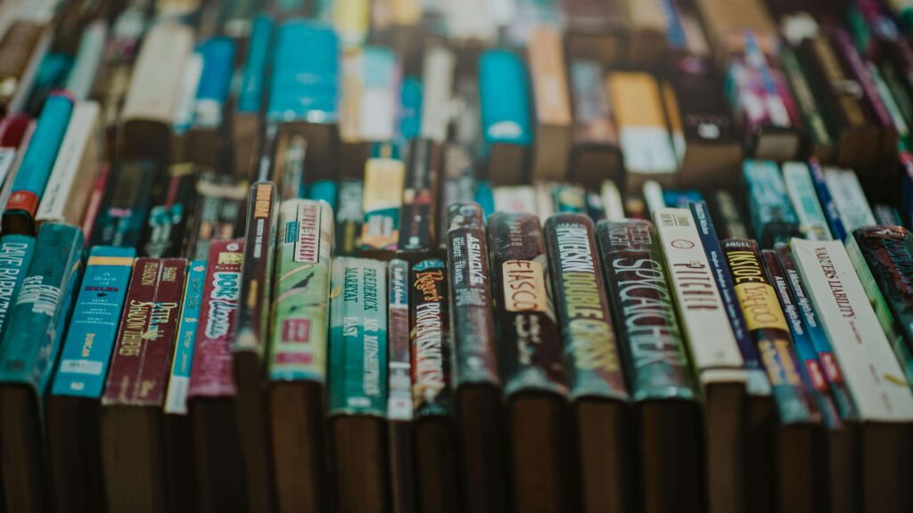 stack of old books in a shelf