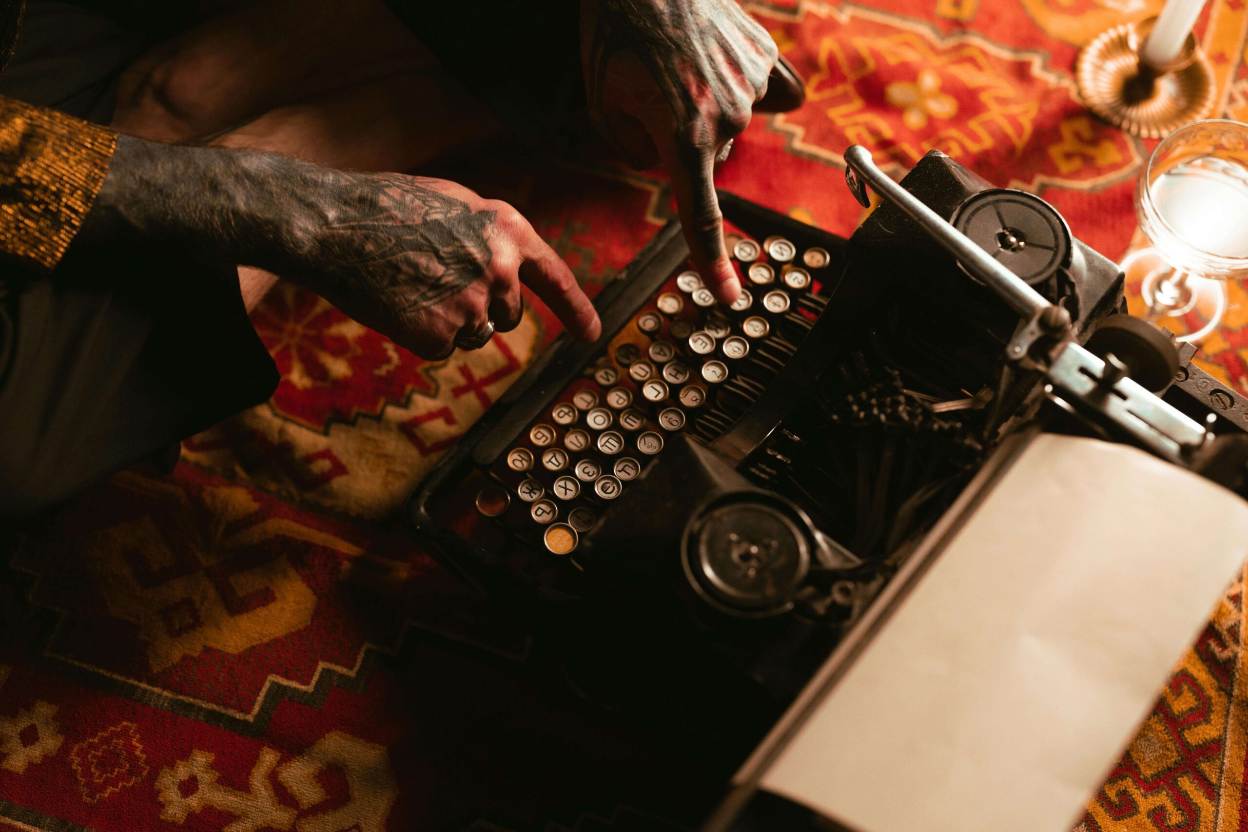 author beginning to write a new book using a typewriter