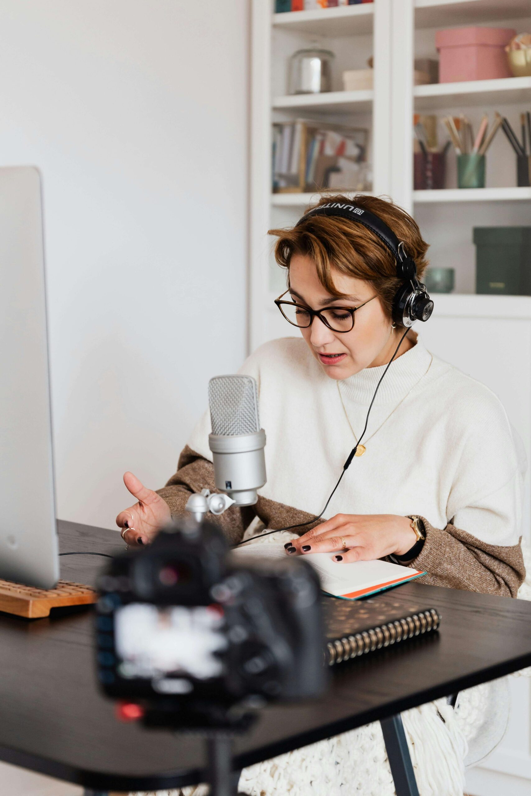 author recording herself reading her book to turn it into an audiobook