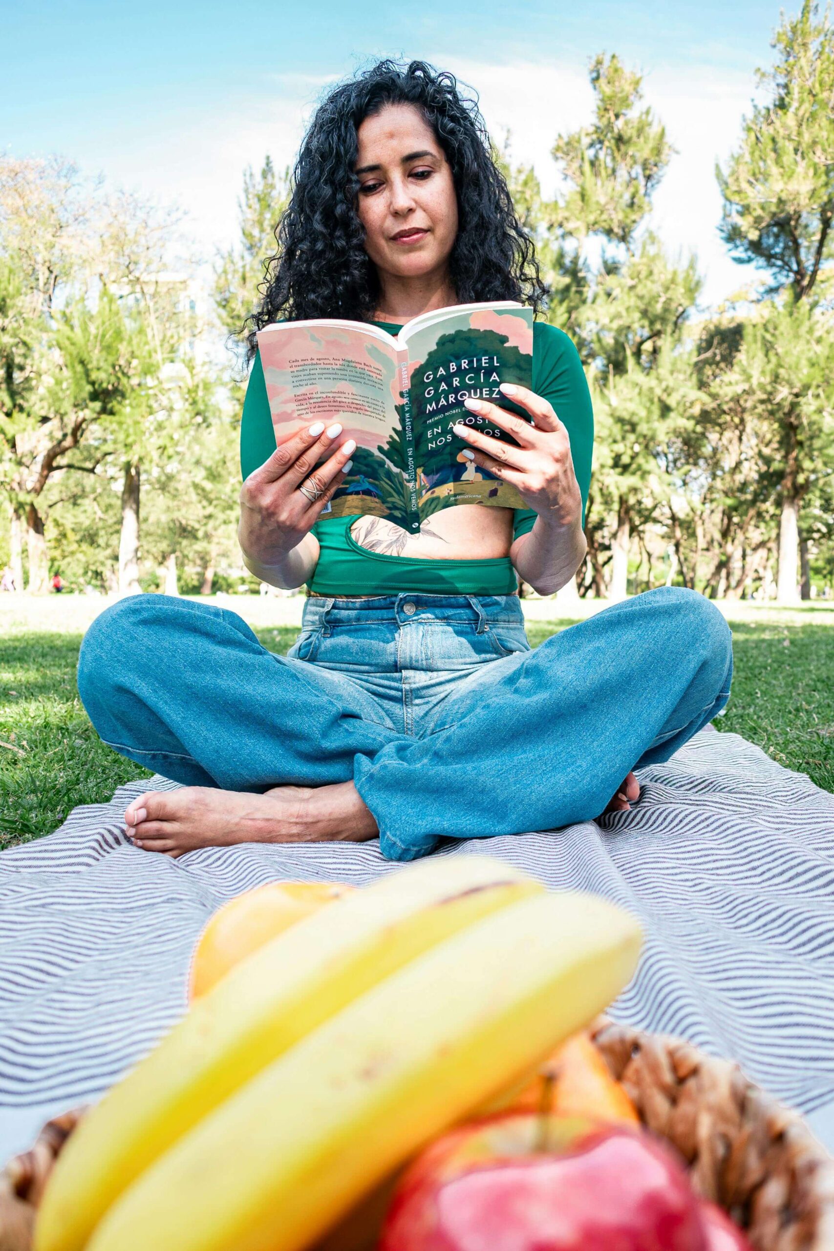 reader excited reading a book outside