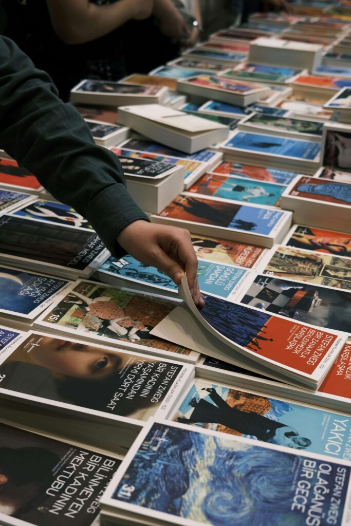 Customer choosing a book to buy